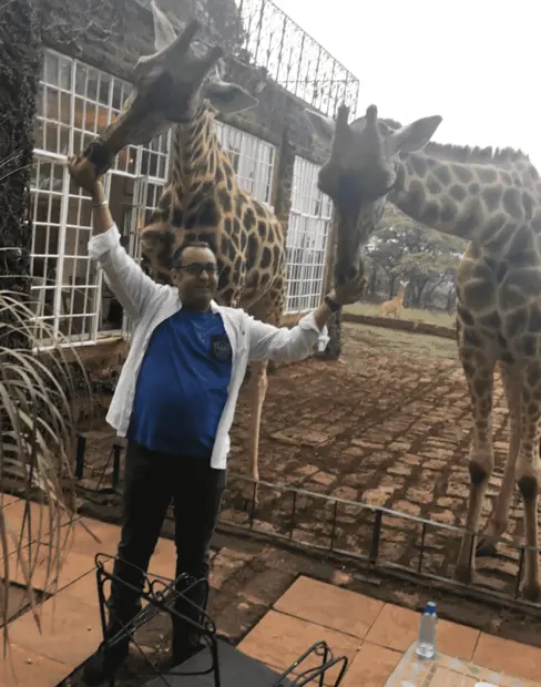 Rasgid Mirmohamed Feeding giraffes