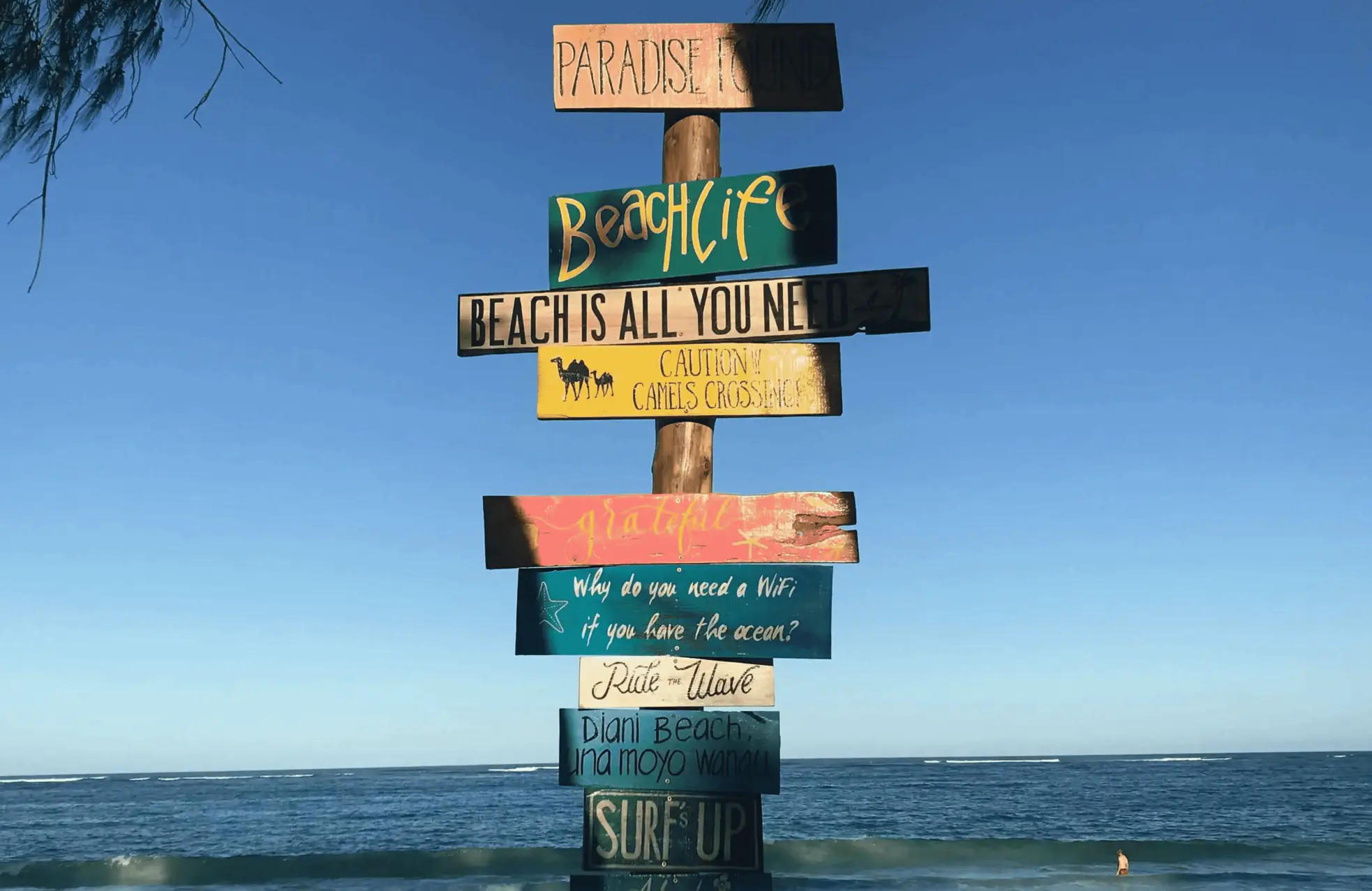 sign filled with beach sayings